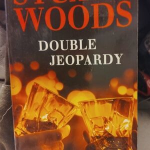 Double Jeopardy by Stuart Woods - Black and Orange Cover